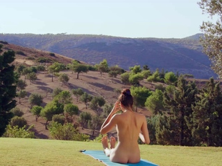 Alissa Foxy during a naked yoga class outdoors